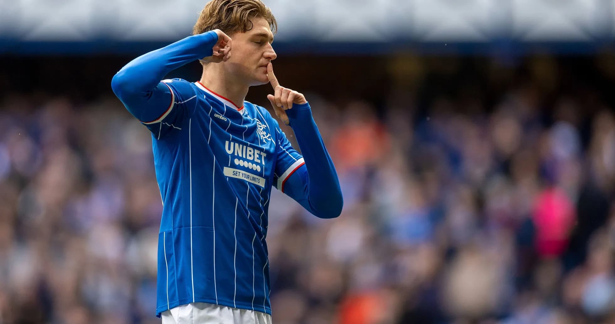 Player celebrating with finger on lips gesture