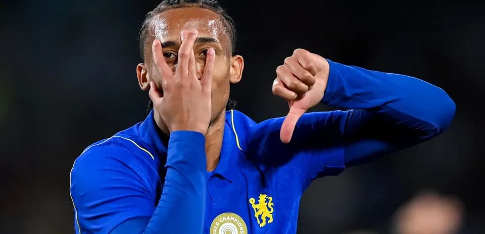 Player gesturing with hands during celebration