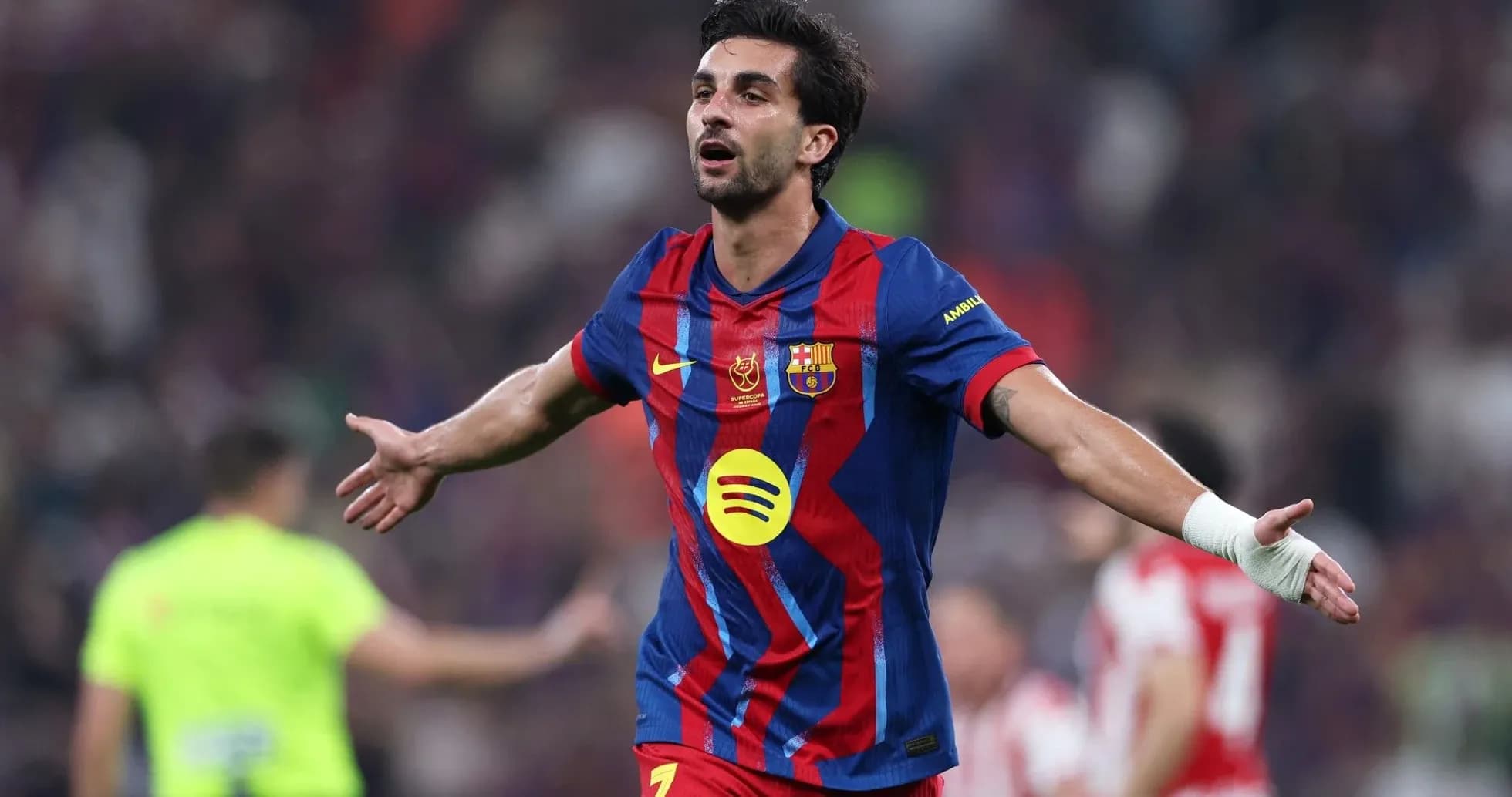 Player celebrating after scoring a goal during match