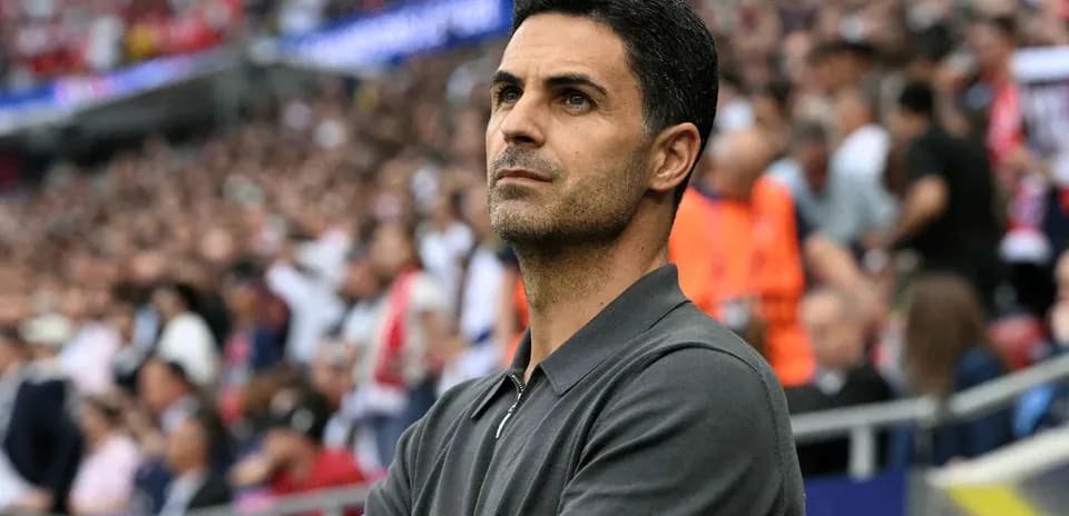 Coach observing the game from the sidelines