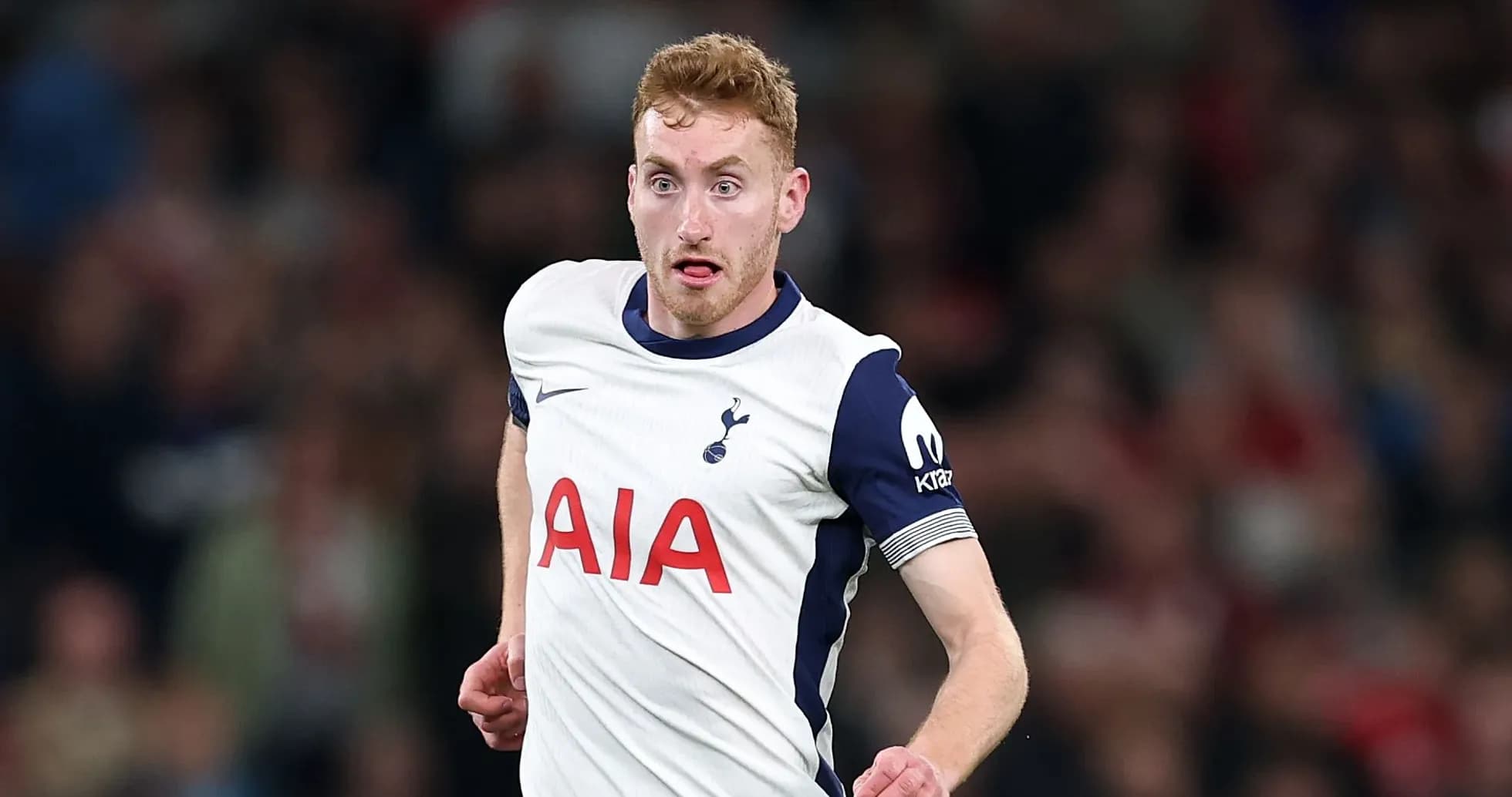 Player running during a football match for Tottenham