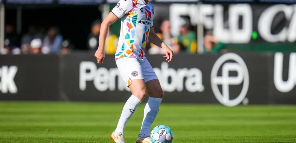 Player dribbling the ball during match
