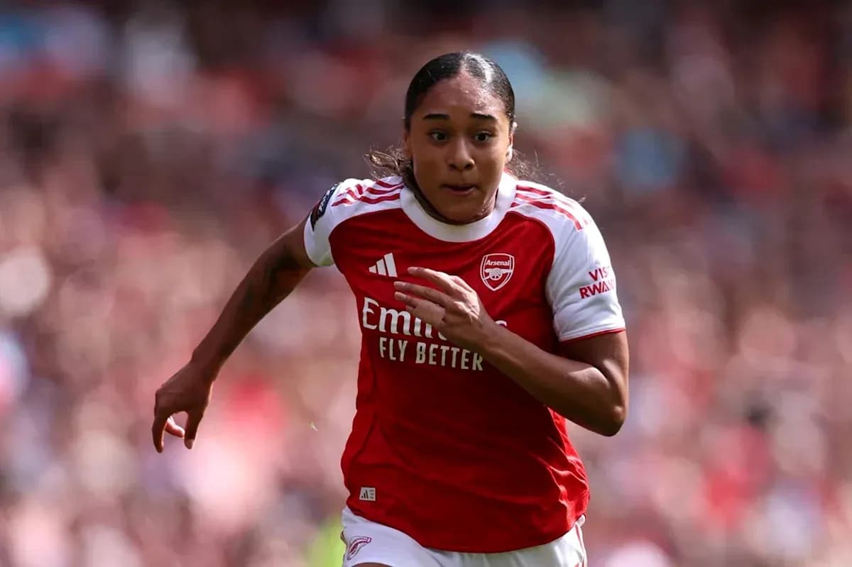 Player sprinting during a match for Arsenal