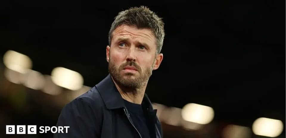 Coach observing match from the sidelines