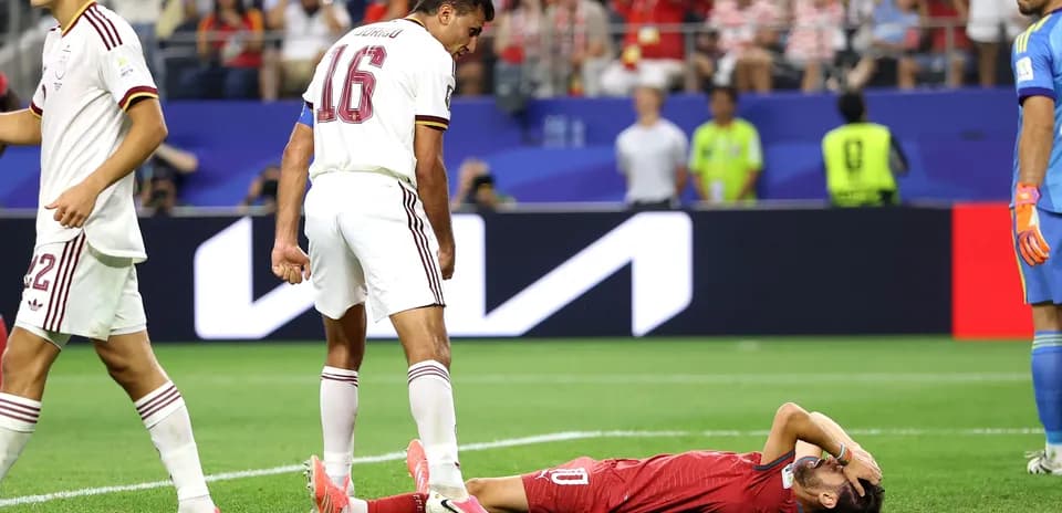 Player lying on the ground after a foul during match