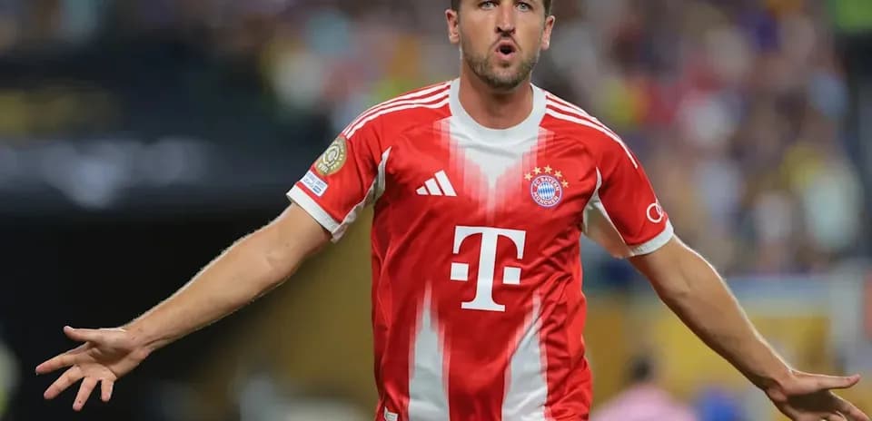 Player celebrating after scoring a goal for Bayern Munich