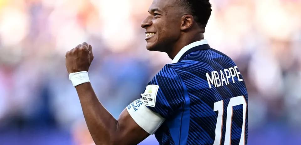 Kylian Mbappé celebrating after scoring a goal