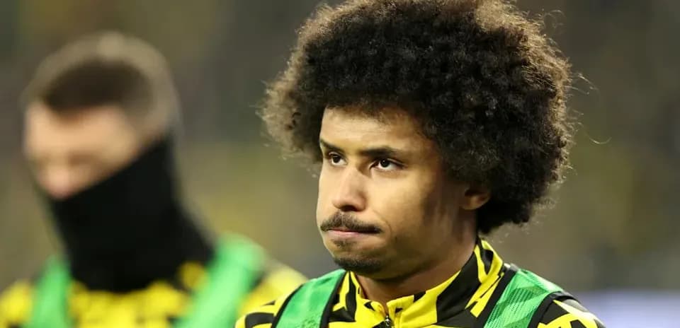 Player in yellow jersey during match warm-up
