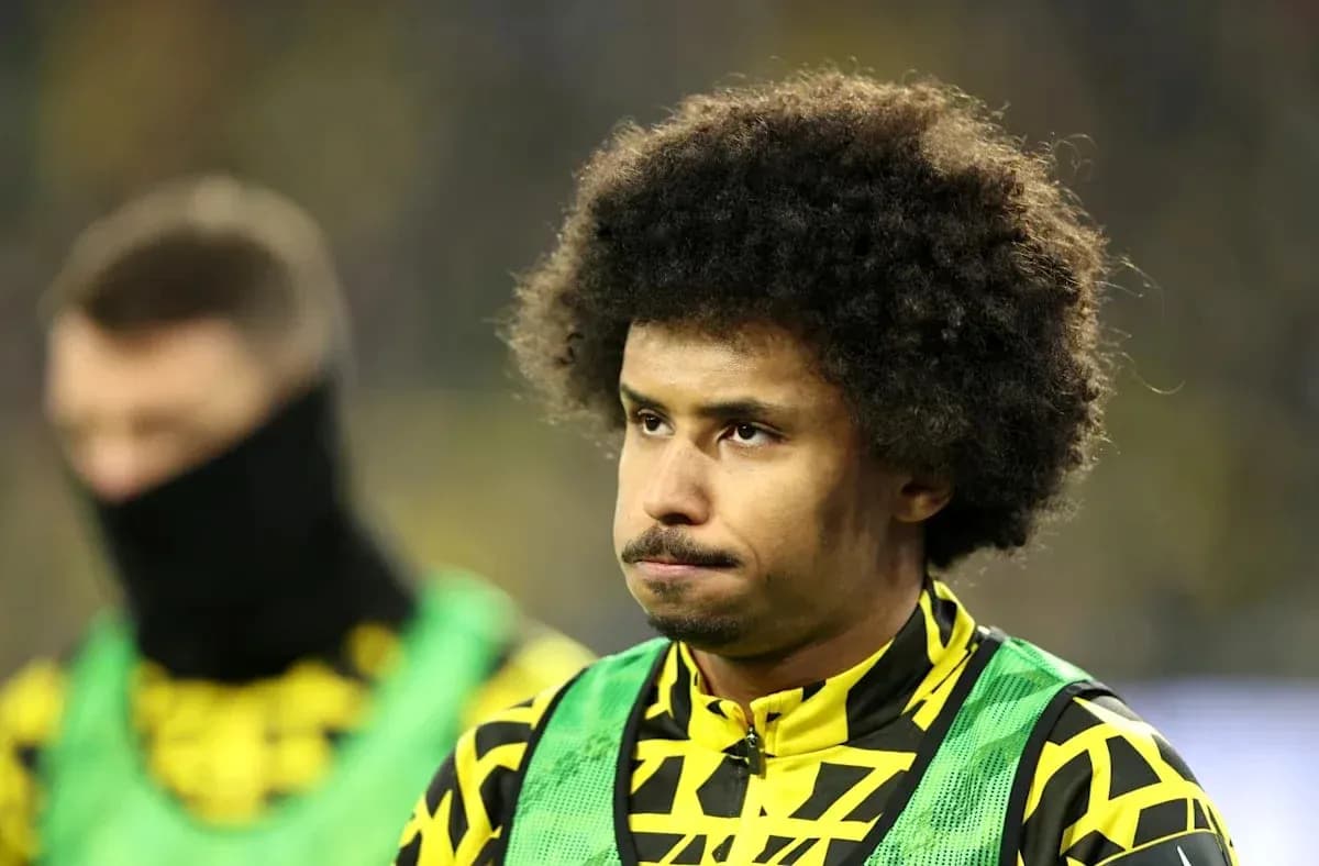 Player in yellow jersey during match warm-up