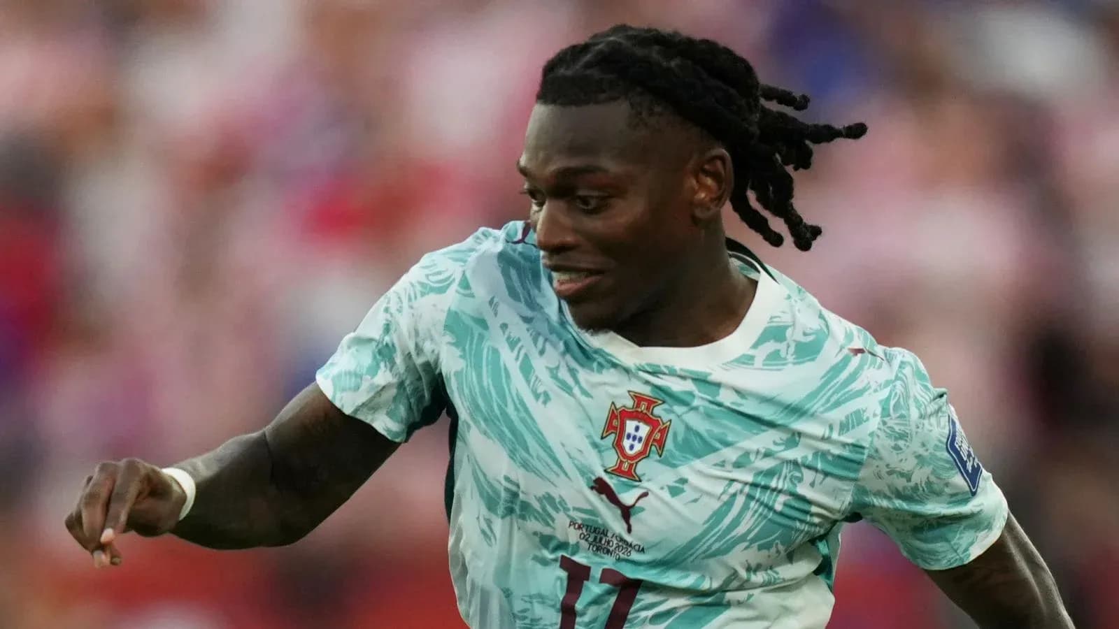 Player in Portugal jersey running during match