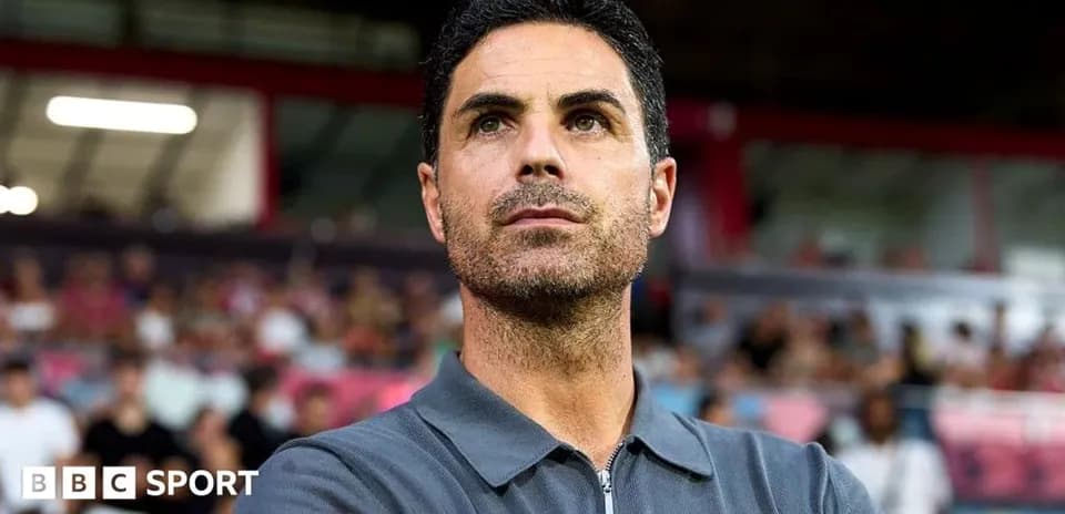 Manager observing the game from the sidelines