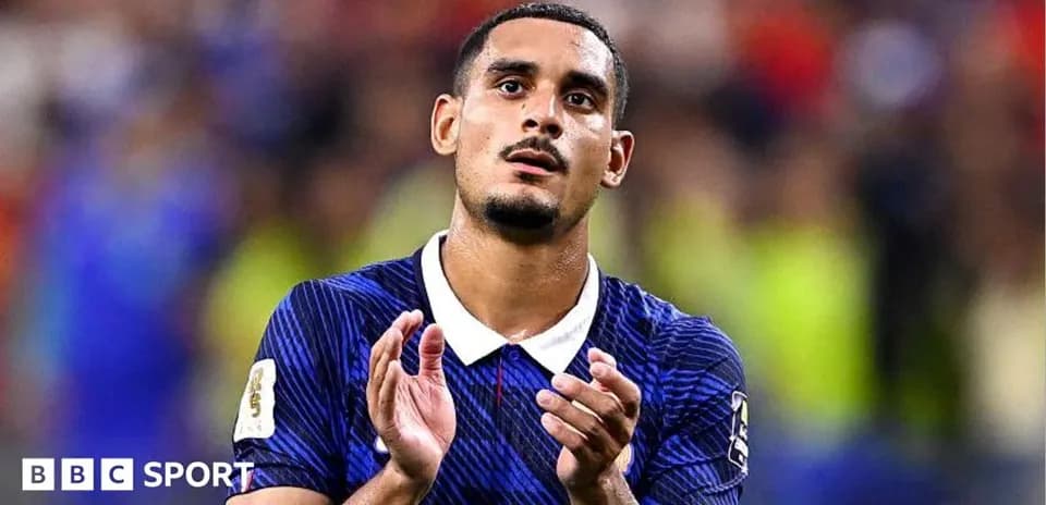 Player applauding fans after a match