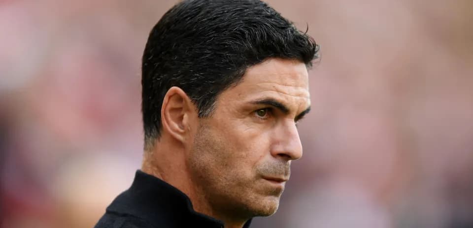 Coach observing the match from the sidelines