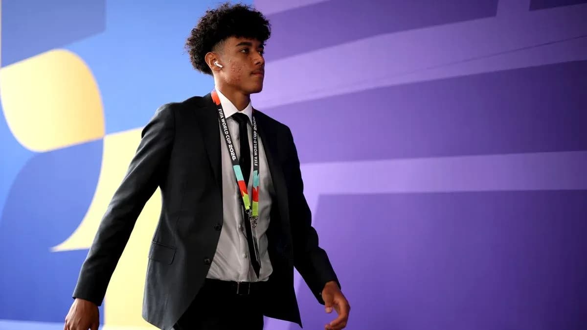 Player walking in suit with FIFA World Cup pass Player walking in suit with FIFA World Cup pass