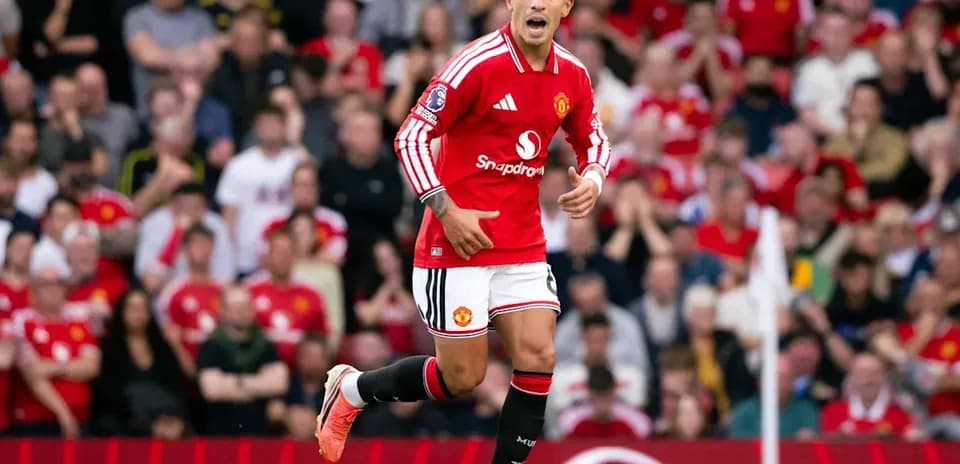 Player celebrating in Manchester United kit on field