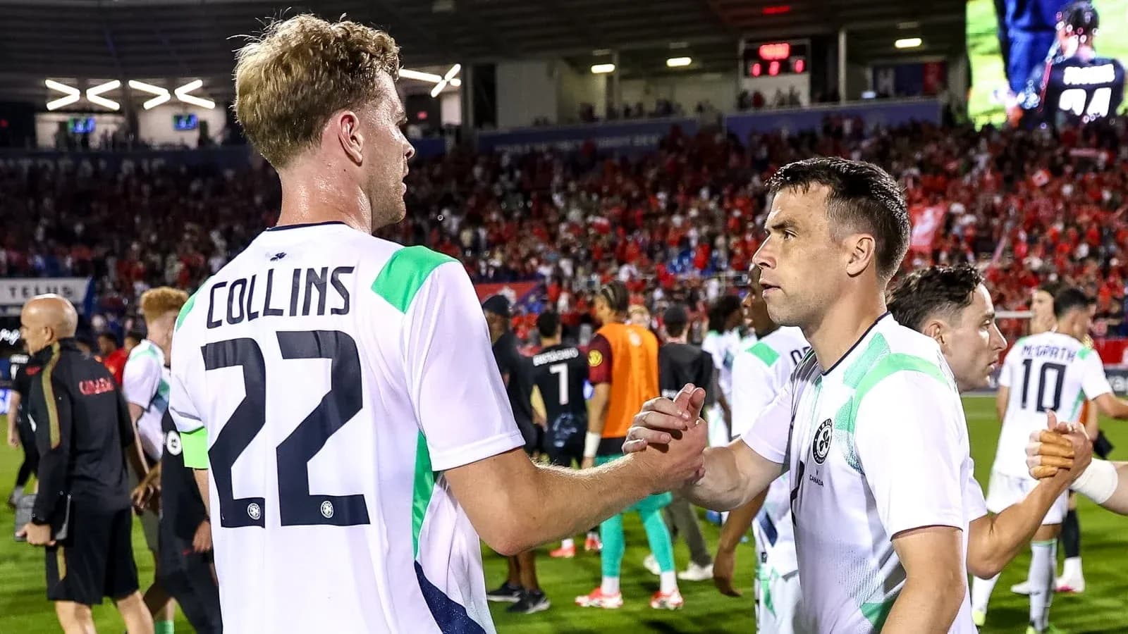 Players shaking hands after a match celebration