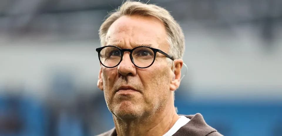 Man with glasses on field during a match