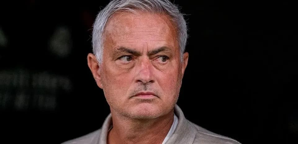 Manager observing match from the sidelines