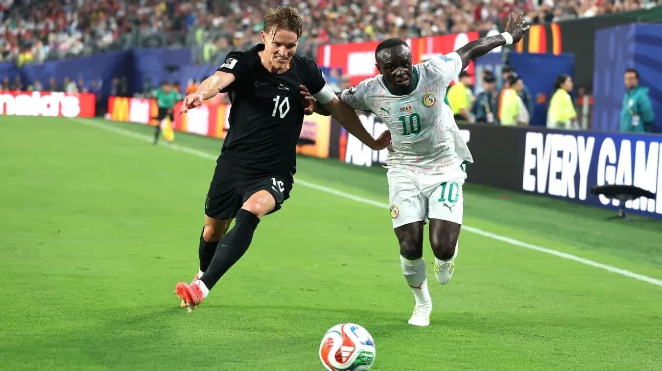 Two players competing for the ball during match