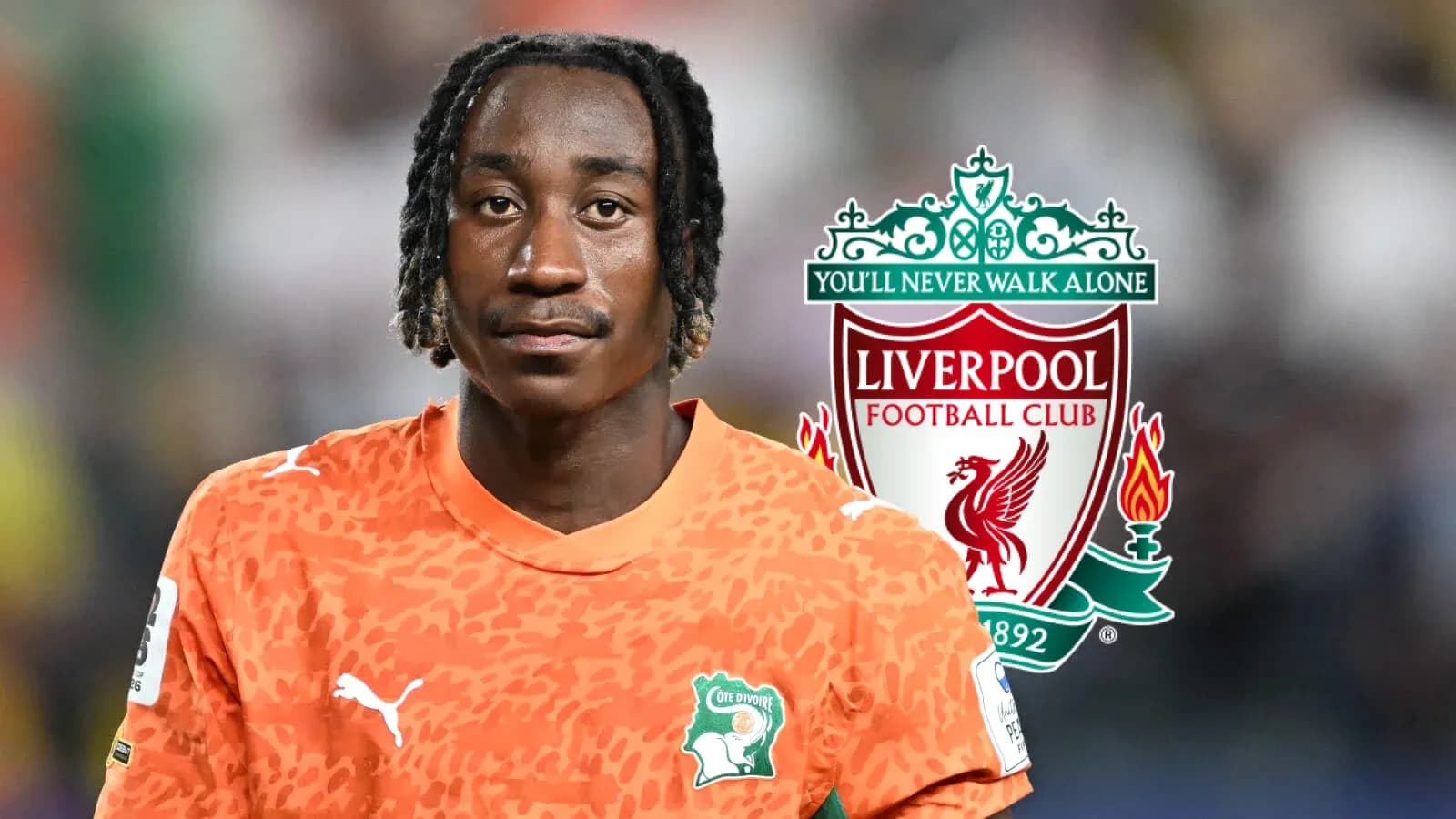 Player in orange kit with Liverpool logo background