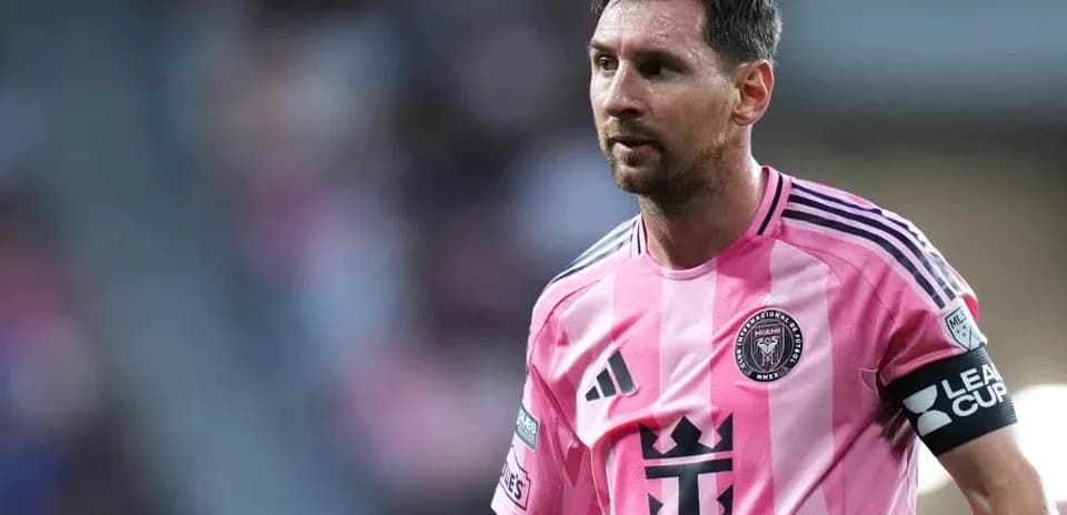 Lionel Messi in pink Inter Miami jersey on field