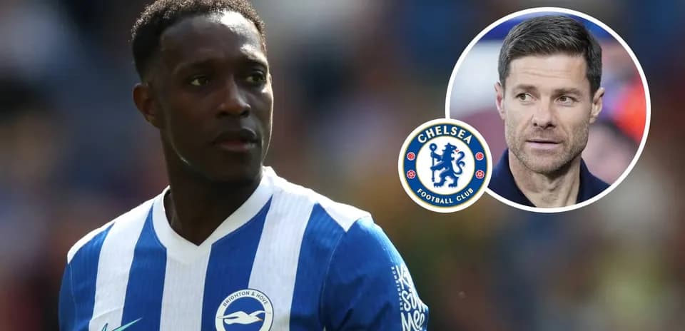 Brighton player on field with Chelsea logo and coach