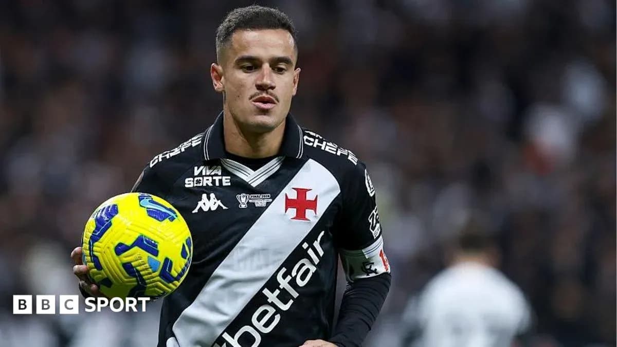 Player holding a ball during a football match