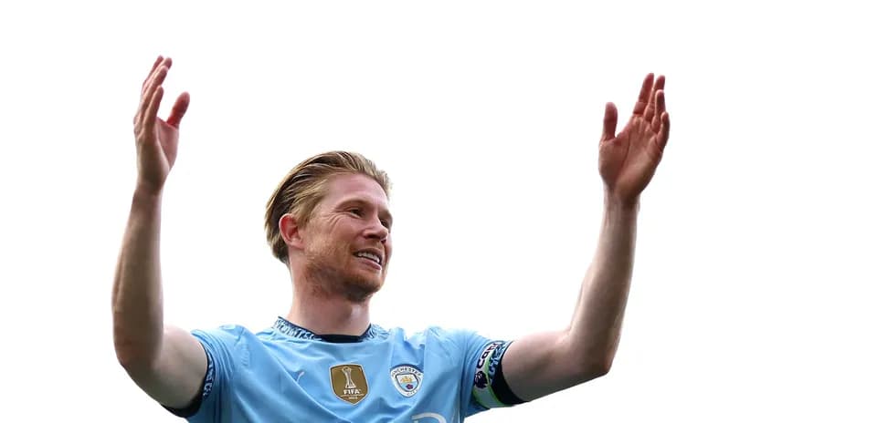 Player celebrating with arms raised in stadium