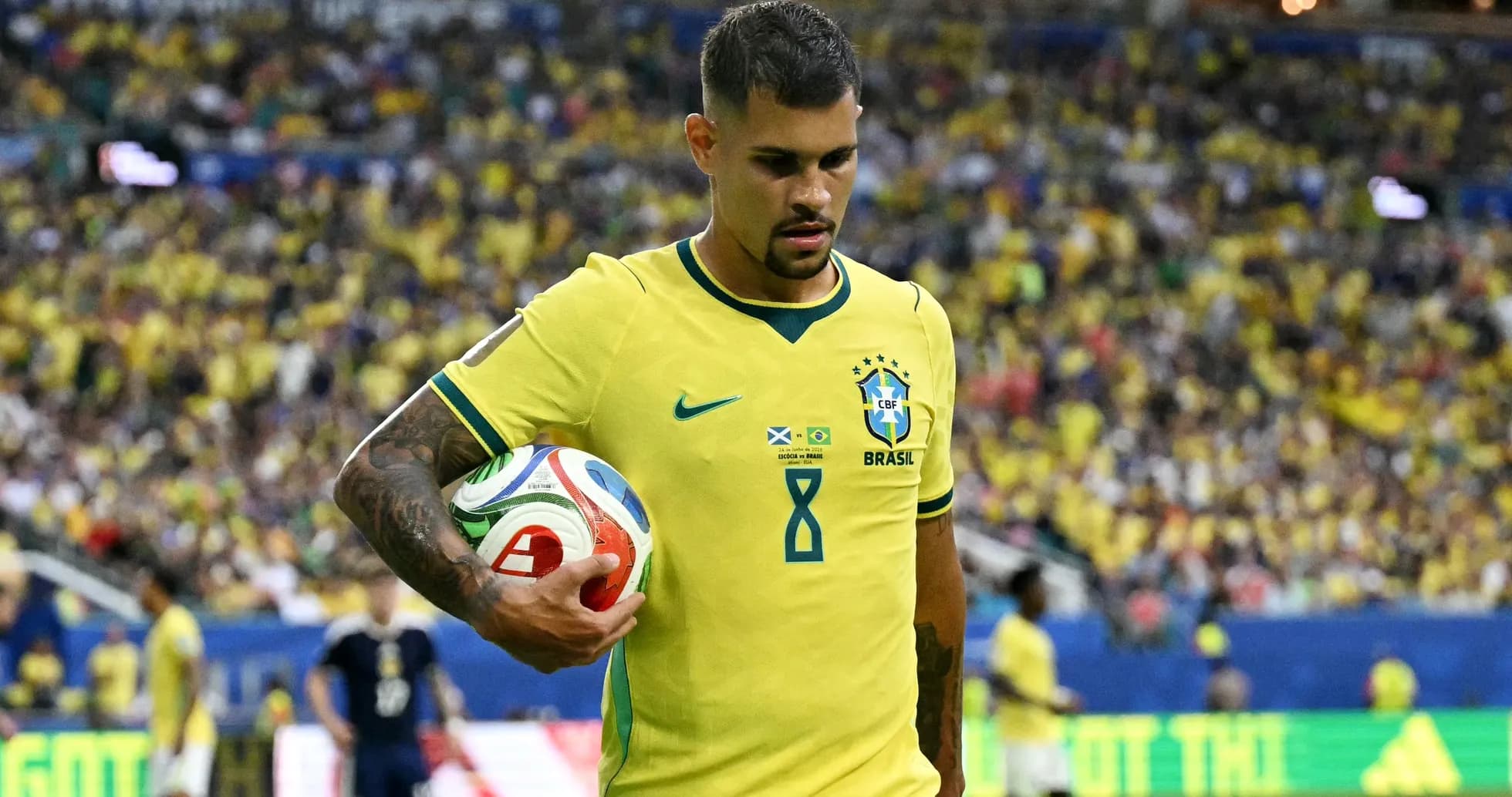 Player holding a soccer ball during match