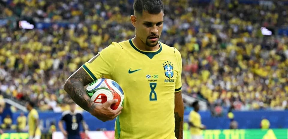 Player holding a soccer ball during match