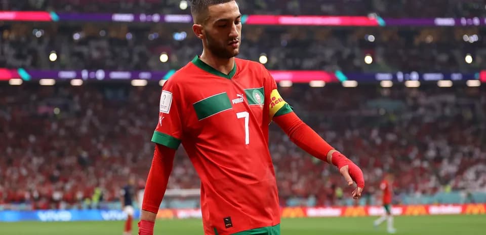 Hakim Ziyech walking on the pitch during match