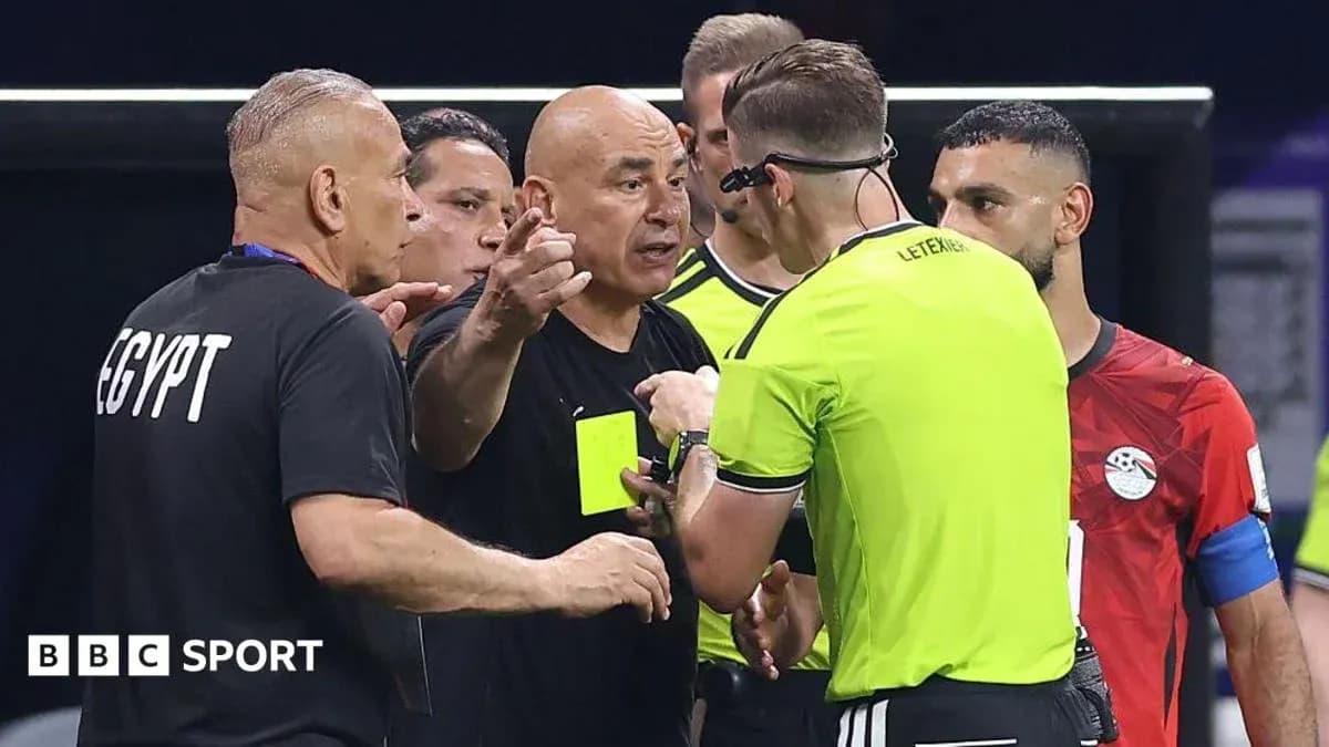 Coach discussing with referee during match controversy