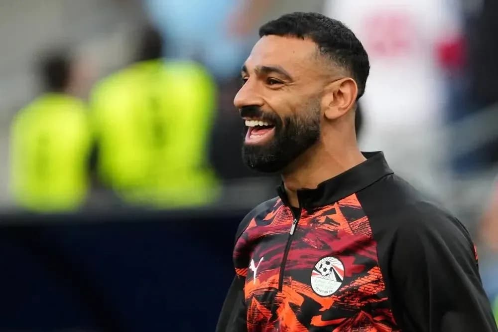 Player smiling during warm-up before the match