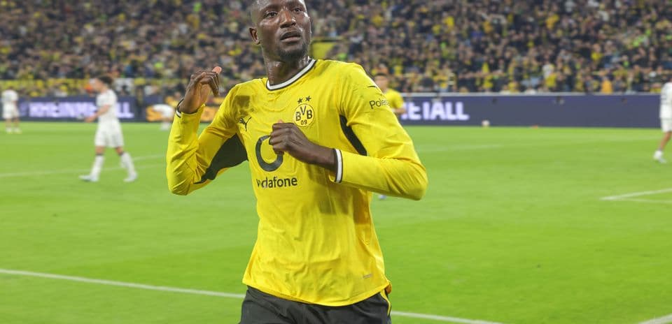 Borussia Dortmund player celebrating on the pitch