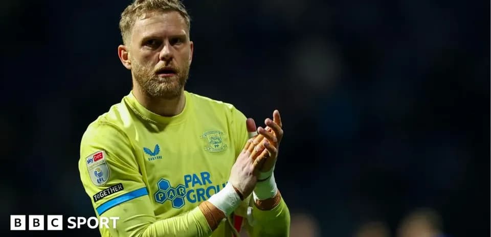 Goalkeeper clapping to fans after the match