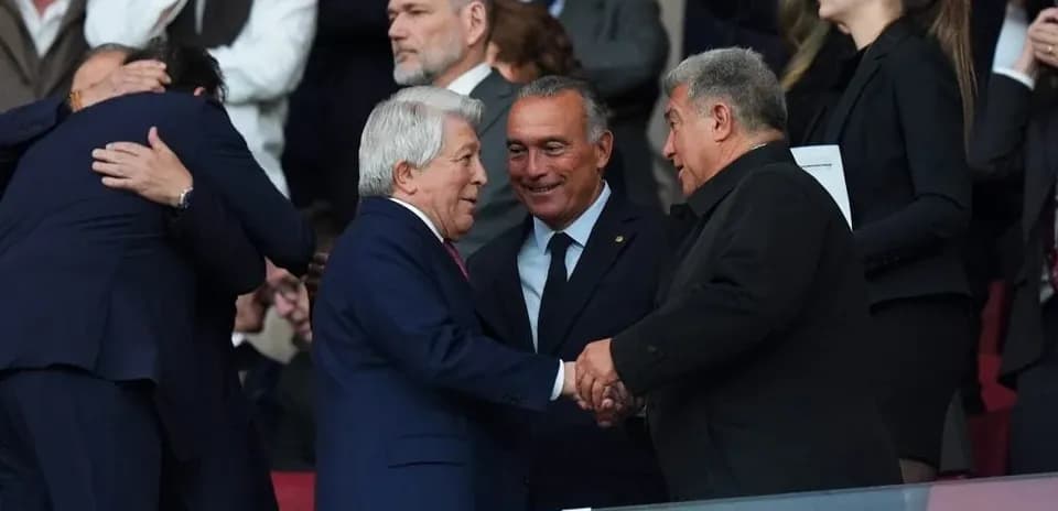 Officials shaking hands in a sports venue