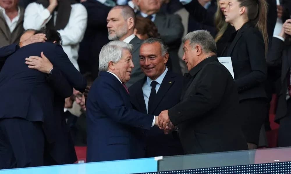 Officials shaking hands in a sports venue