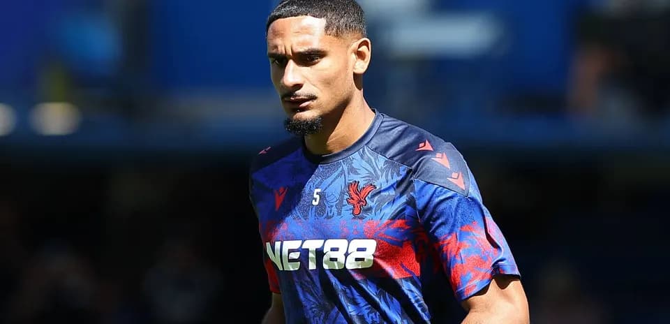 Player in Crystal Palace training kit on pitch