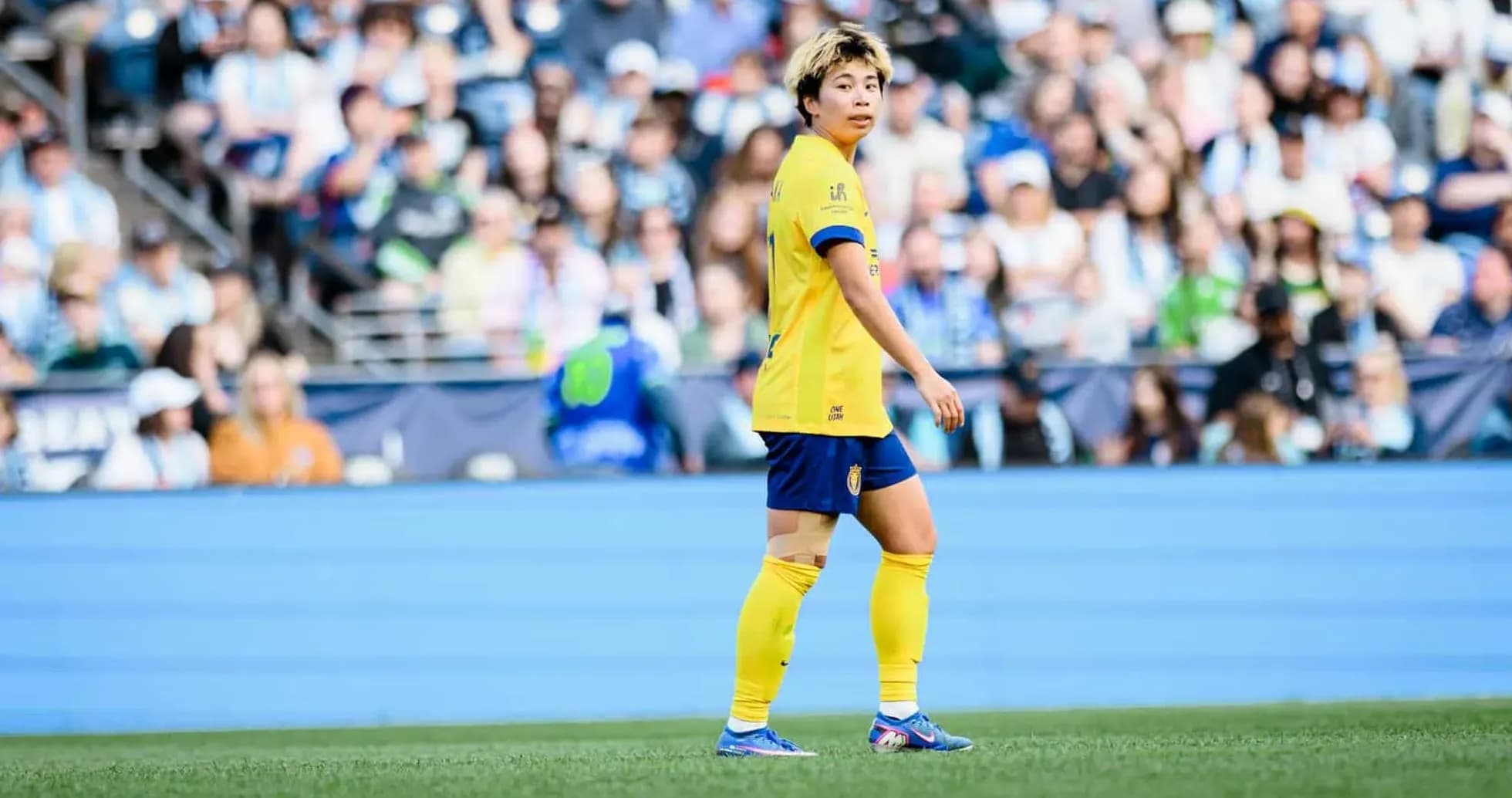 Player in yellow jersey during match