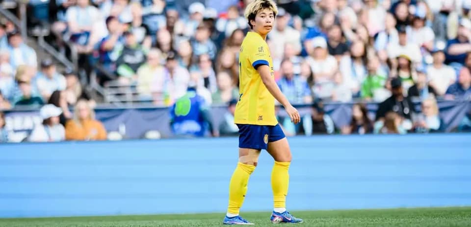 Player in yellow jersey during match