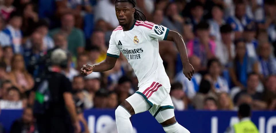 Real Madrid player running during a match