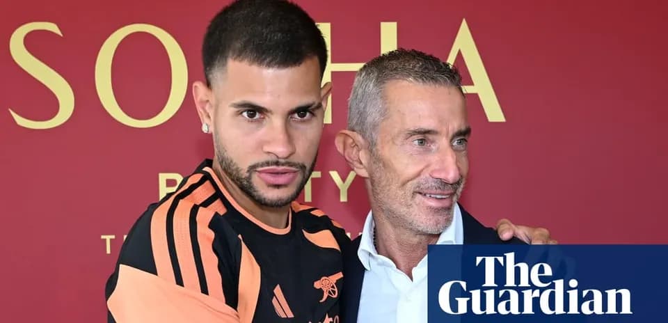Player and manager posing together at press event