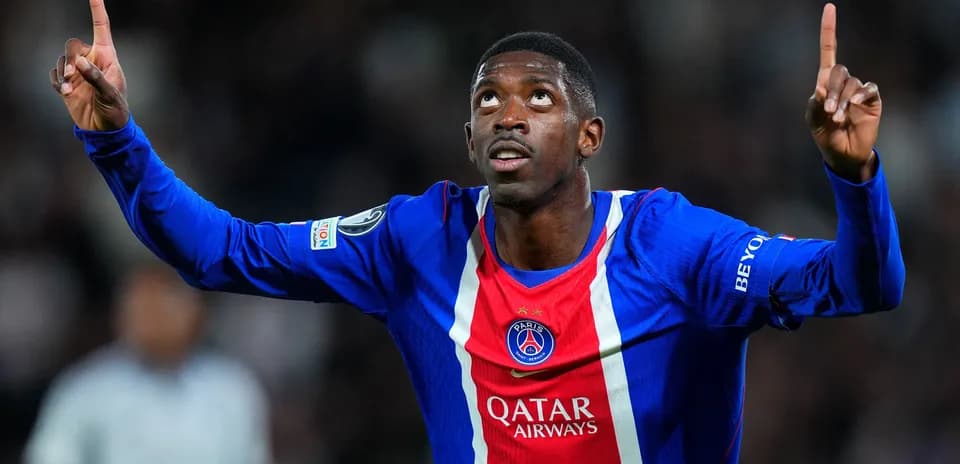 Player celebrating a goal in PSG jersey