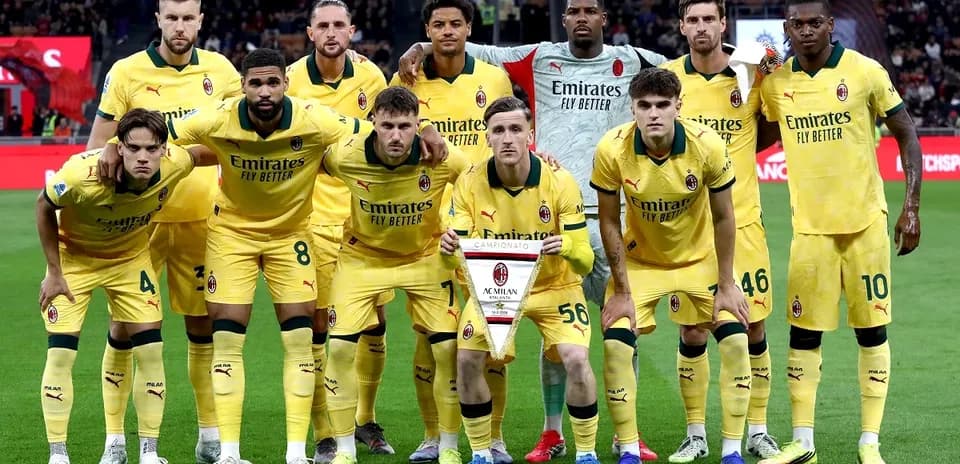 AC Milan team posing for a match