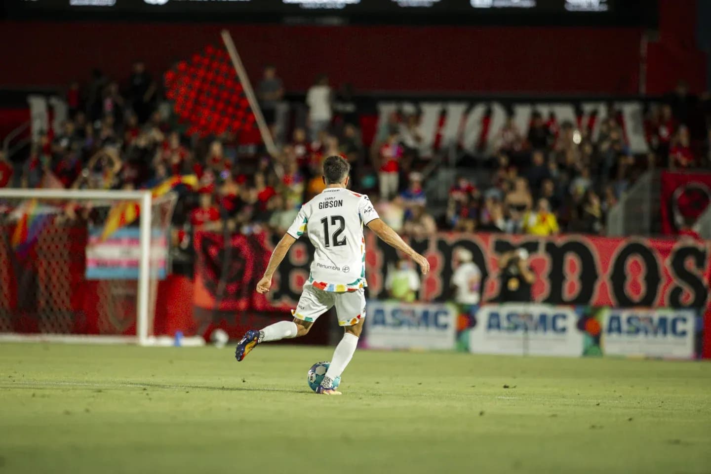Player Gibson in action during match