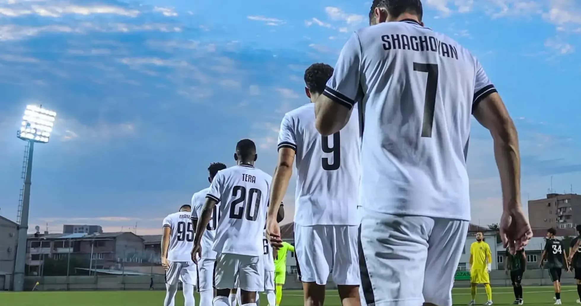 Players walking onto the pitch before match