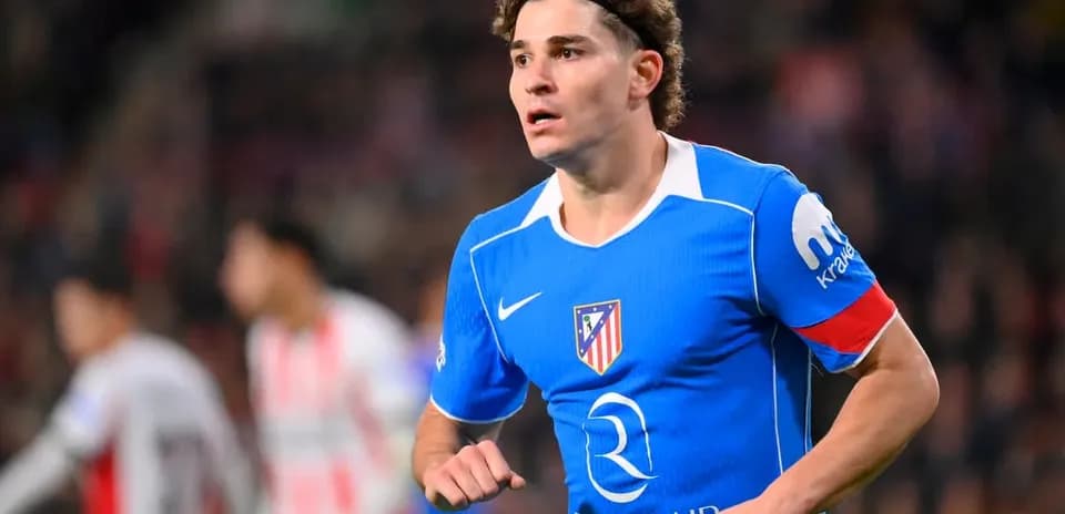 Player in blue Atletico Madrid kit during match