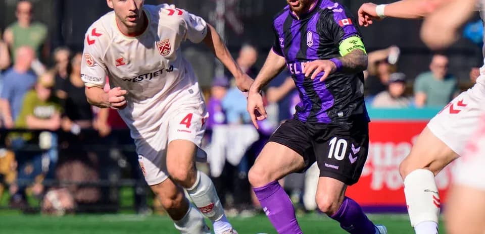 Cavalry FC player pursuing the ball