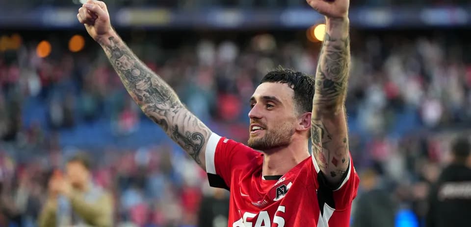 Player celebrating victory with raised arms