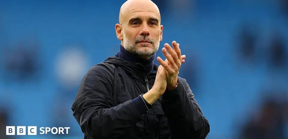 Manager applauding fans after the match